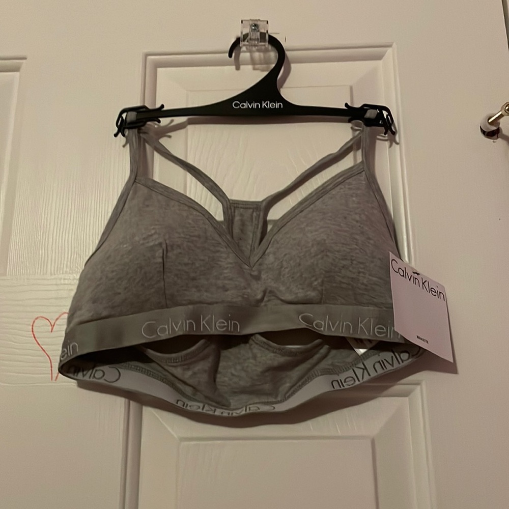 Tag still on Calvin Klein sports bra